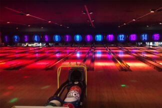 Two Games of Bowling with Hotdog and Chips for Two Adults and Two Children at Disco Bowl
