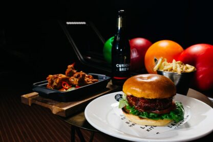 Main Meal with a Drink and a Game of Bowling or Karaoke for Two at All Star Lanes